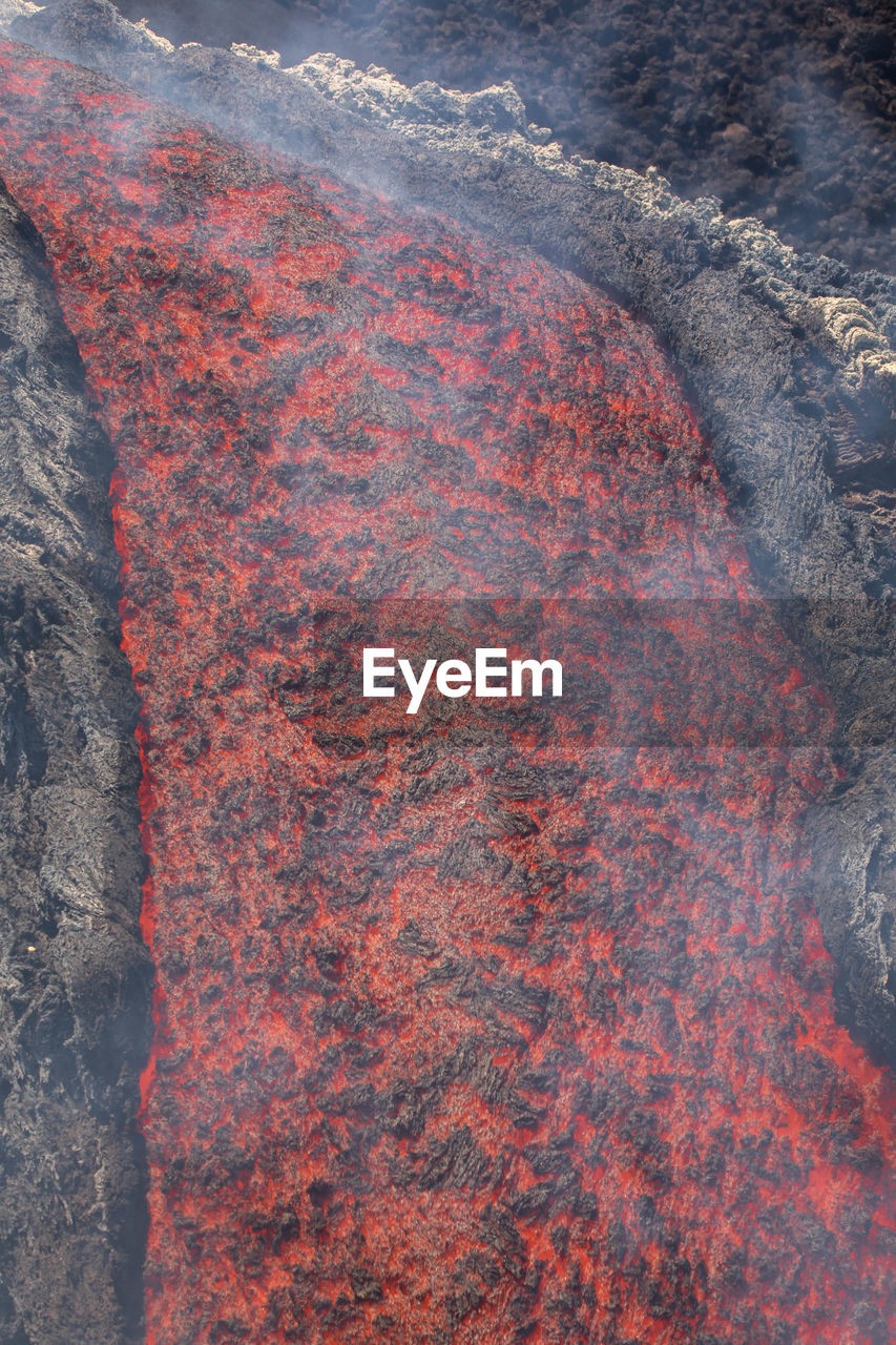 rock, no people, high angle view, day, asphalt, red, soil, geology, nature, water, lava, land, outdoors, volcano, full frame, beauty in nature, close-up, textured, reef, backgrounds, pattern
