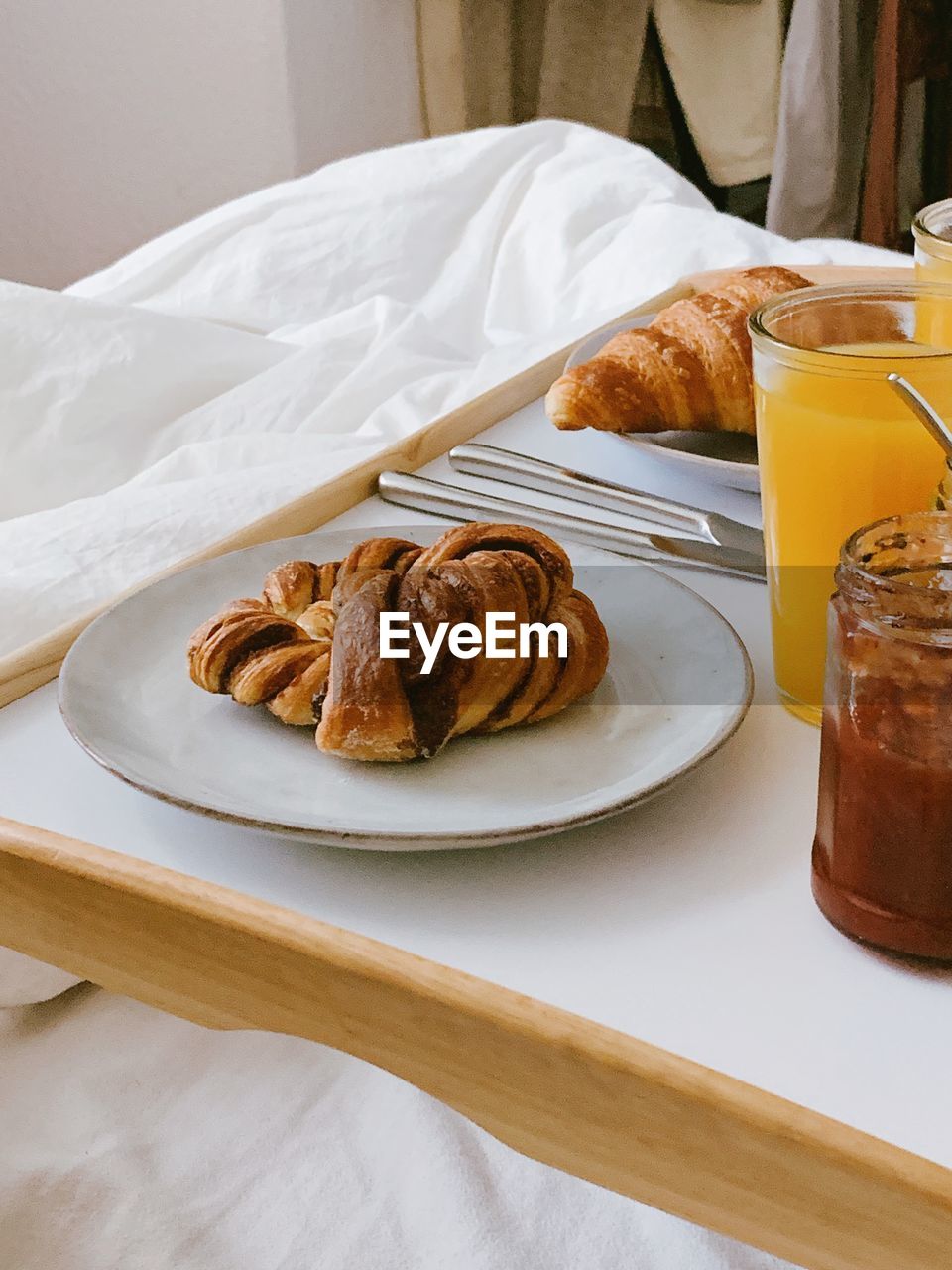 High angle view of breakfast served on table in bed