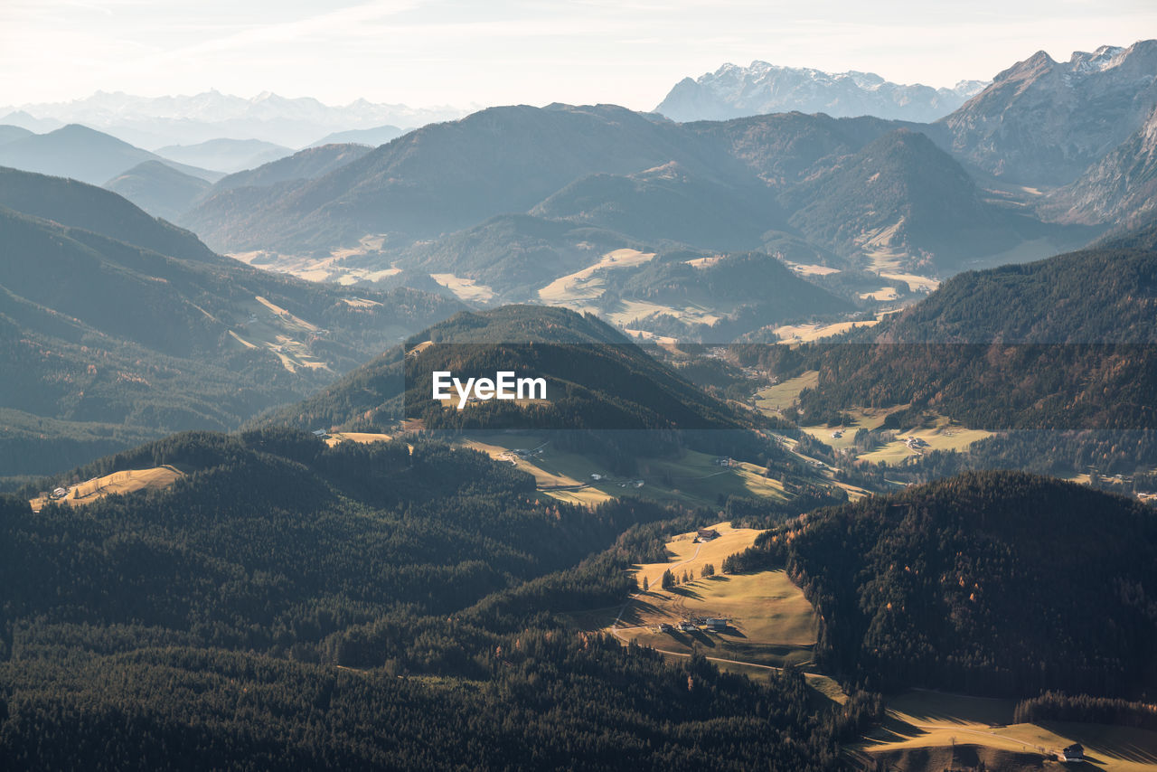 Panoramic view at layers of hills and mountains in the austrian alps near filzmoos, austria.