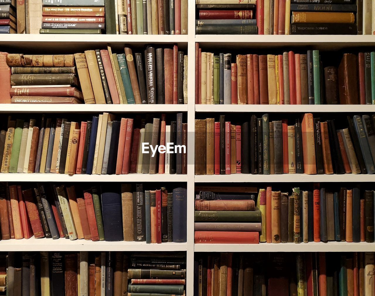 FULL FRAME OF BOOKS IN SHELF