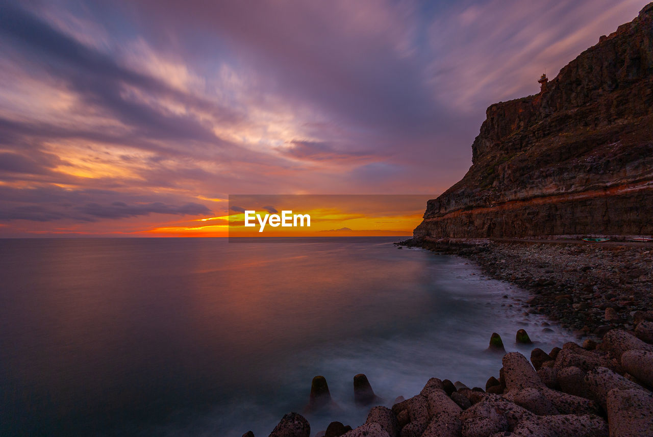 Scenic view of sea against sky during sunset