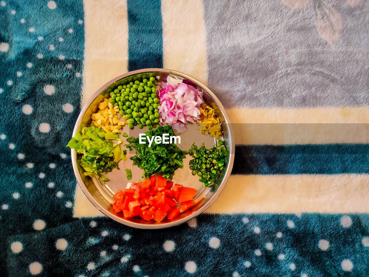 High angle view of chopped vegetables in bowl on table