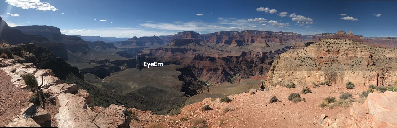 Panoramic view of rocky mountains against sky