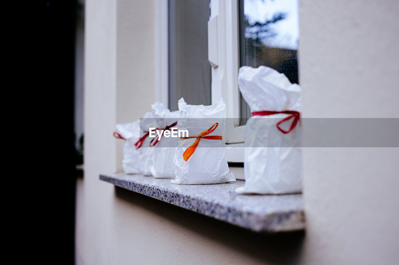 White presents on window sill