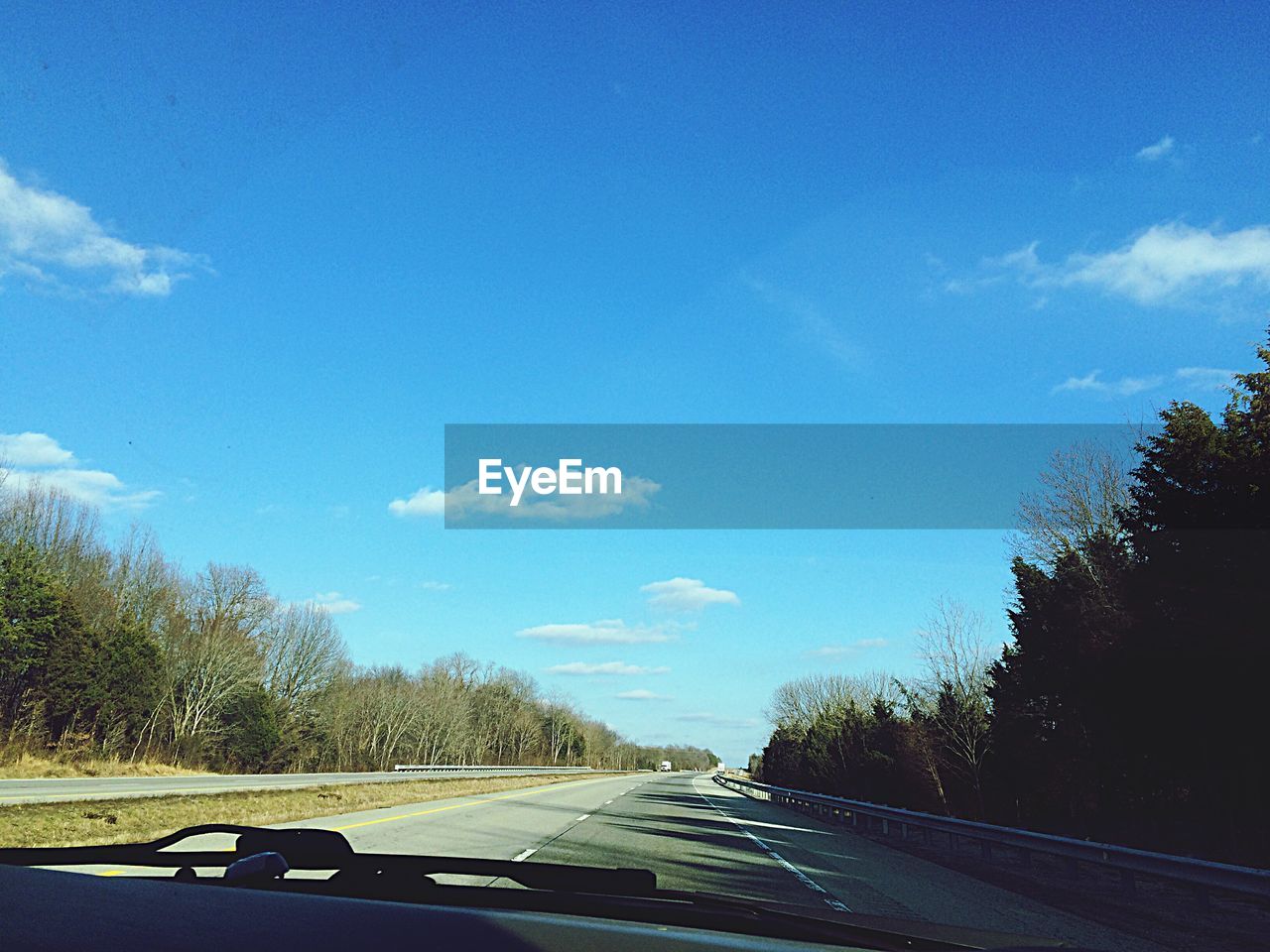 View of road against blue sky