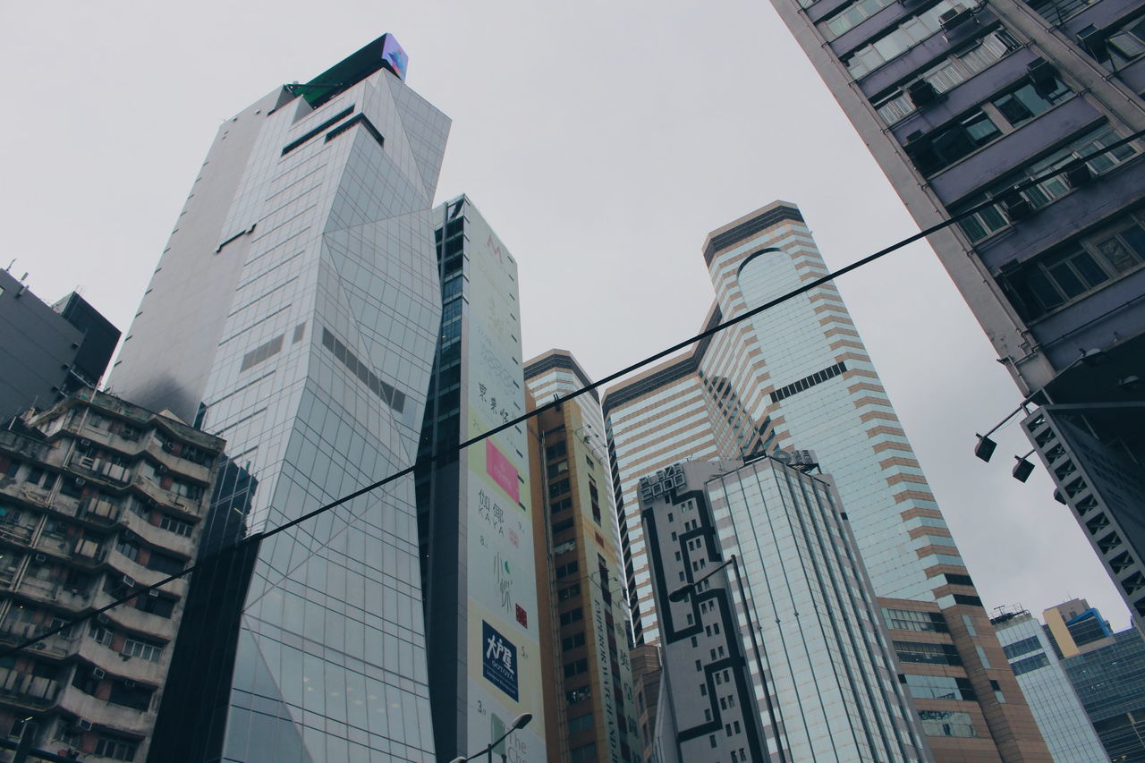 LOW ANGLE VIEW OF SKYSCRAPERS AGAINST SKY