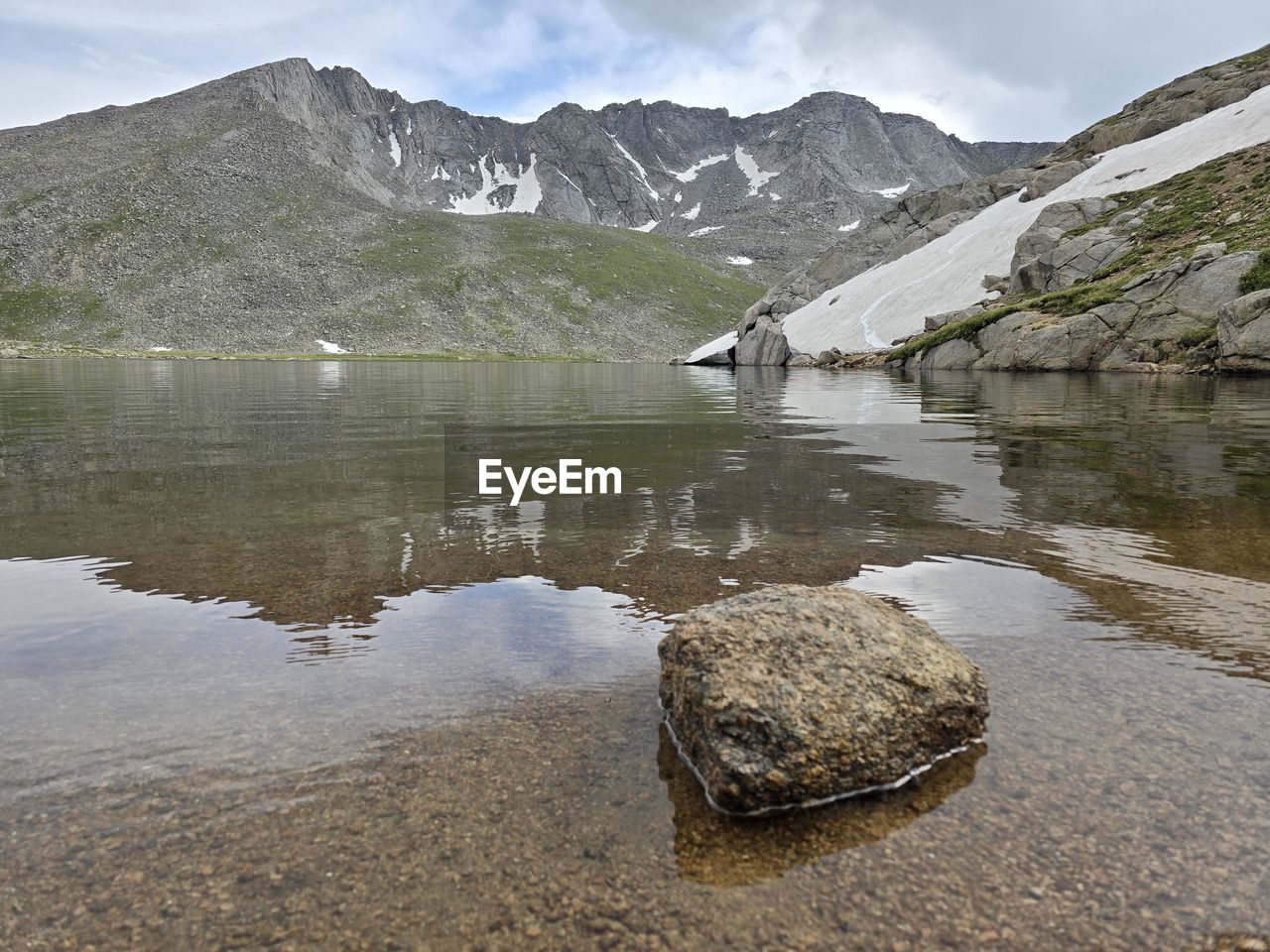 water, mountain, scenics - nature, environment, beauty in nature, landscape, lake, mountain range, nature, snow, reflection, sky, land, wilderness, cold temperature, cloud, tranquility, travel destinations, travel, tranquil scene, winter, no people, snowcapped mountain, rock, reservoir, mountain peak, outdoors, tourism, day, non-urban scene, ice, valley, beach, forest, body of water, activity, idyllic, tree, plant, vacation, glacier