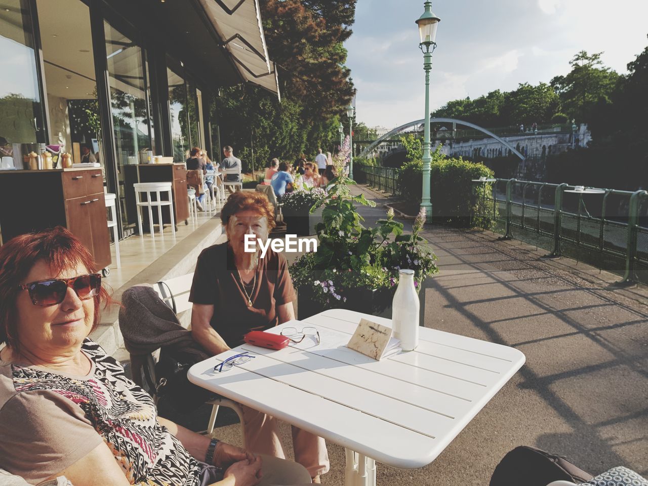 PORTRAIT OF PEOPLE SITTING IN RESTAURANT