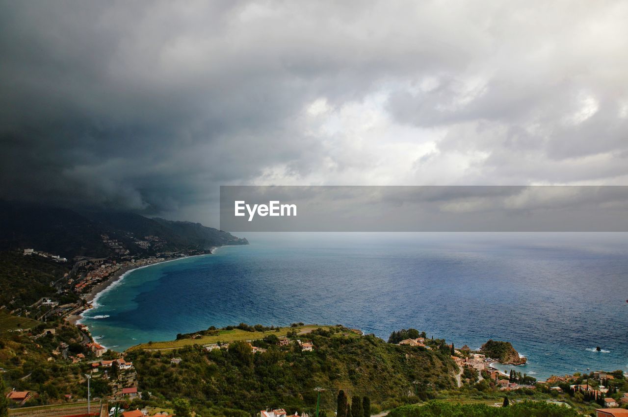 Panoramic view of the sicilian coast from the city of taormina. 