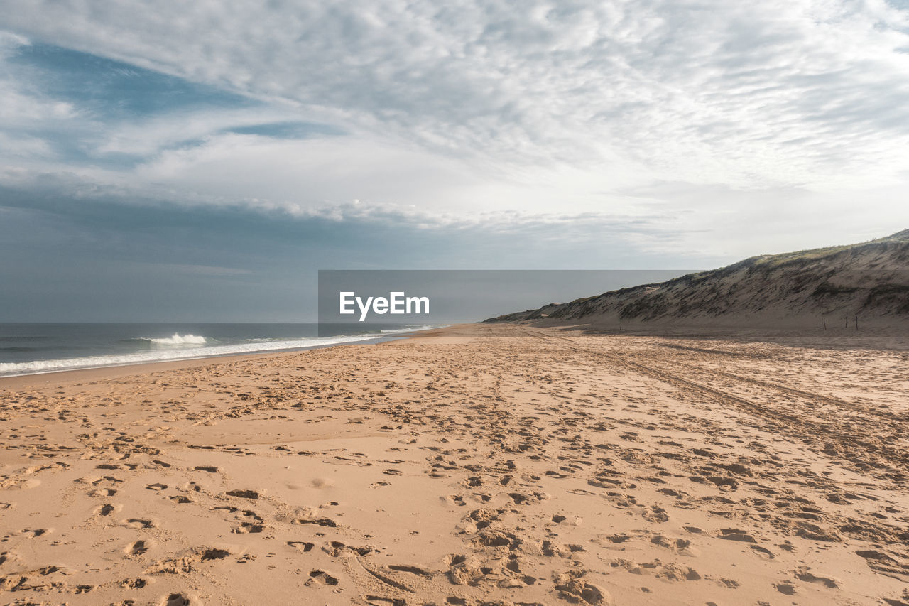 Scenic view of beach against sky