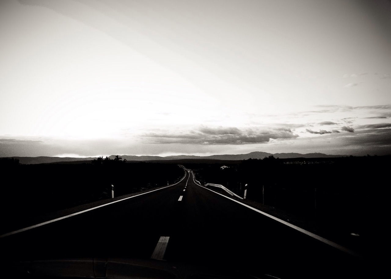 Silhouette landscape against sky