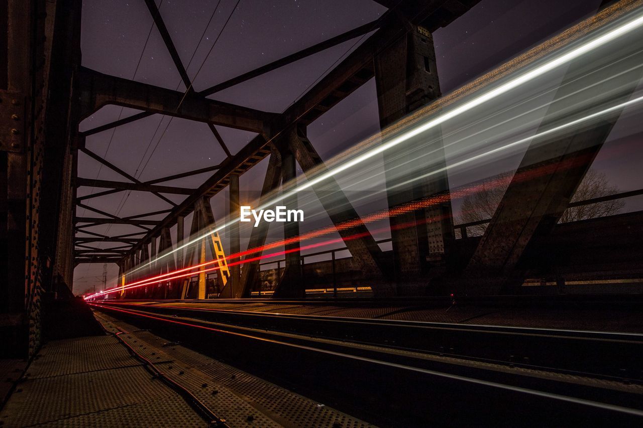 Blurred motion of train at railroad station platform