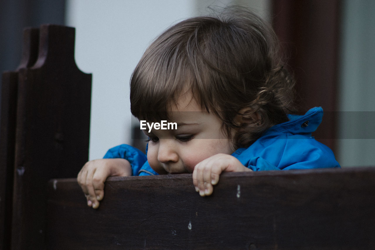Close-up of baby girl at home