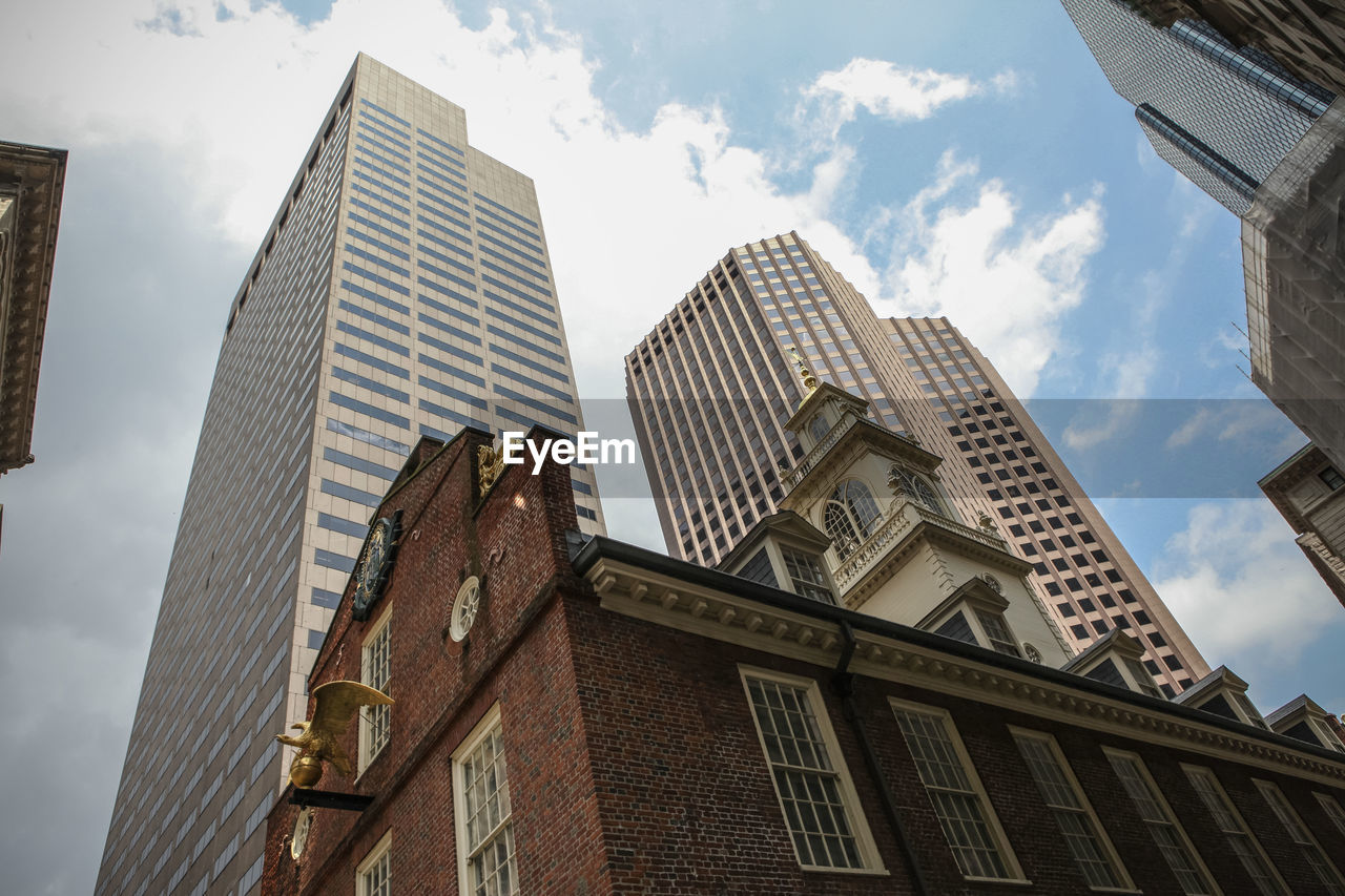 Low angle view of skyscrapers against sky