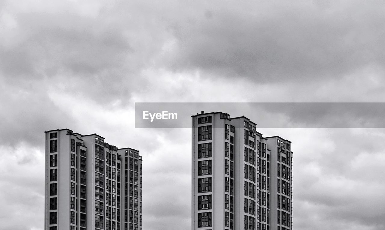 Low angle view of skyscrapers against sky