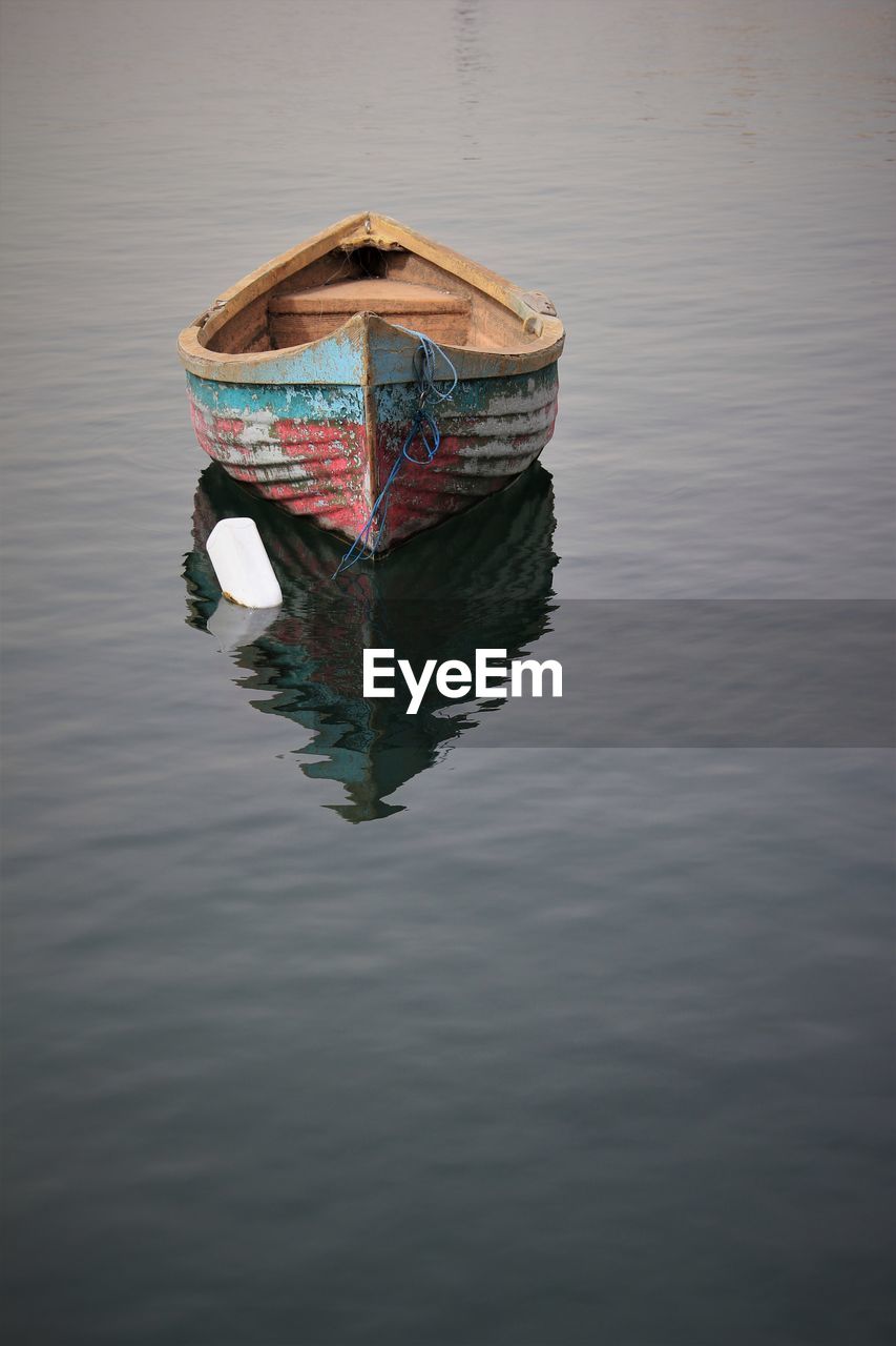 Lonely fisher boat at sea