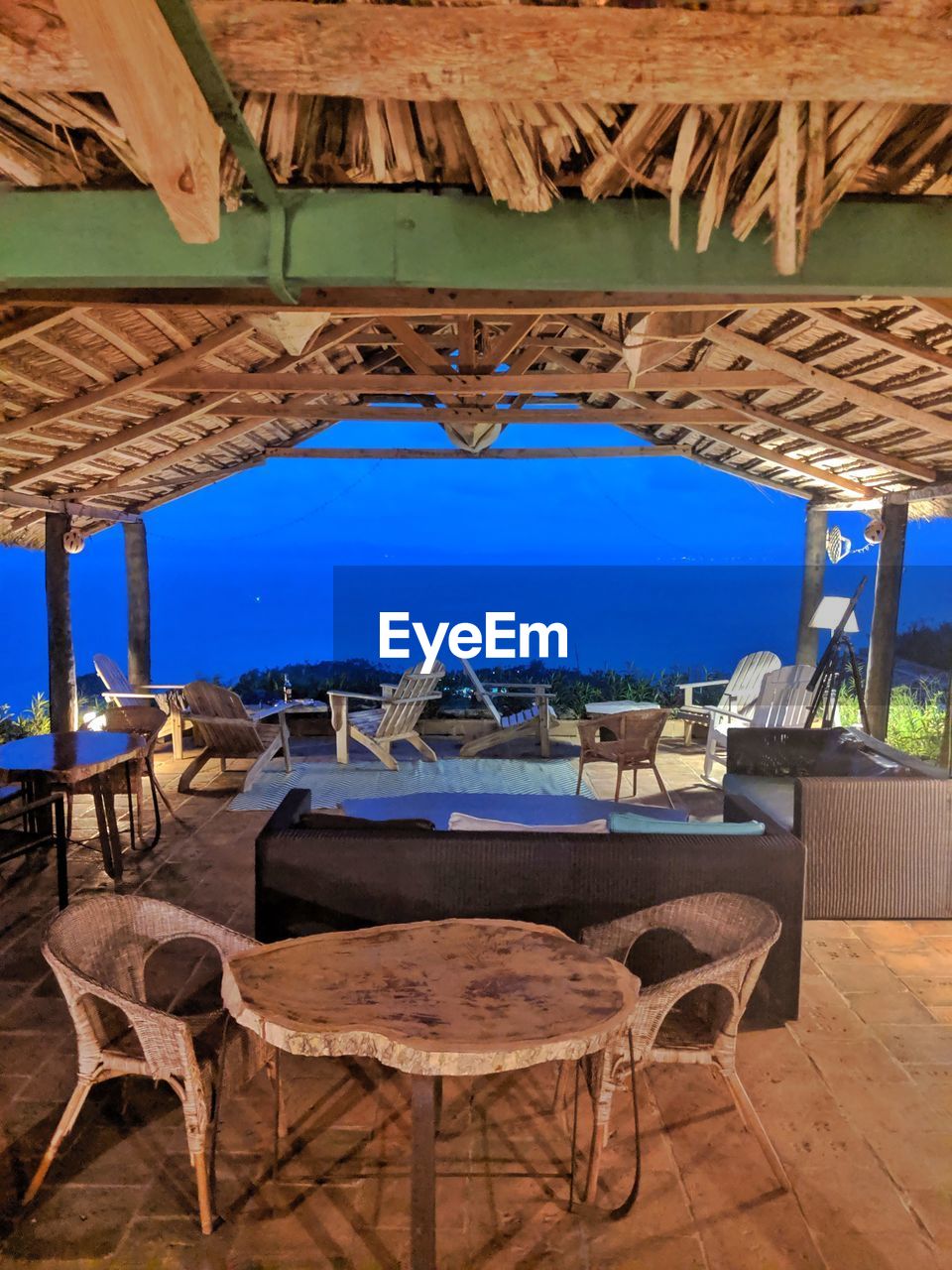 CHAIRS AND TABLES AT RESTAURANT