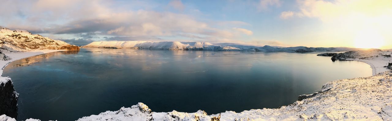 PANORAMIC VIEW OF LAKE AGAINST SKY DURING WINTER