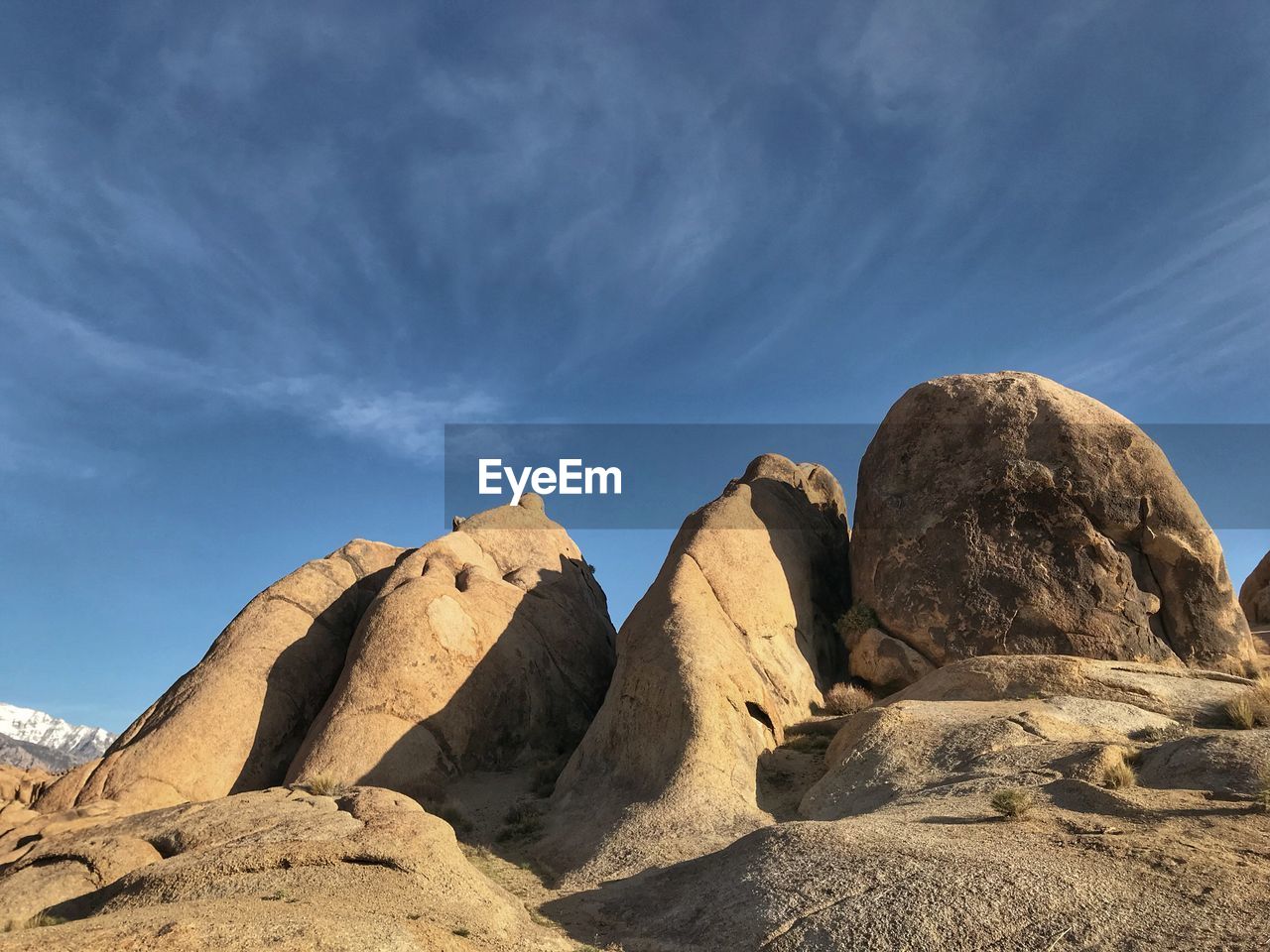Low angle view of four large boulders