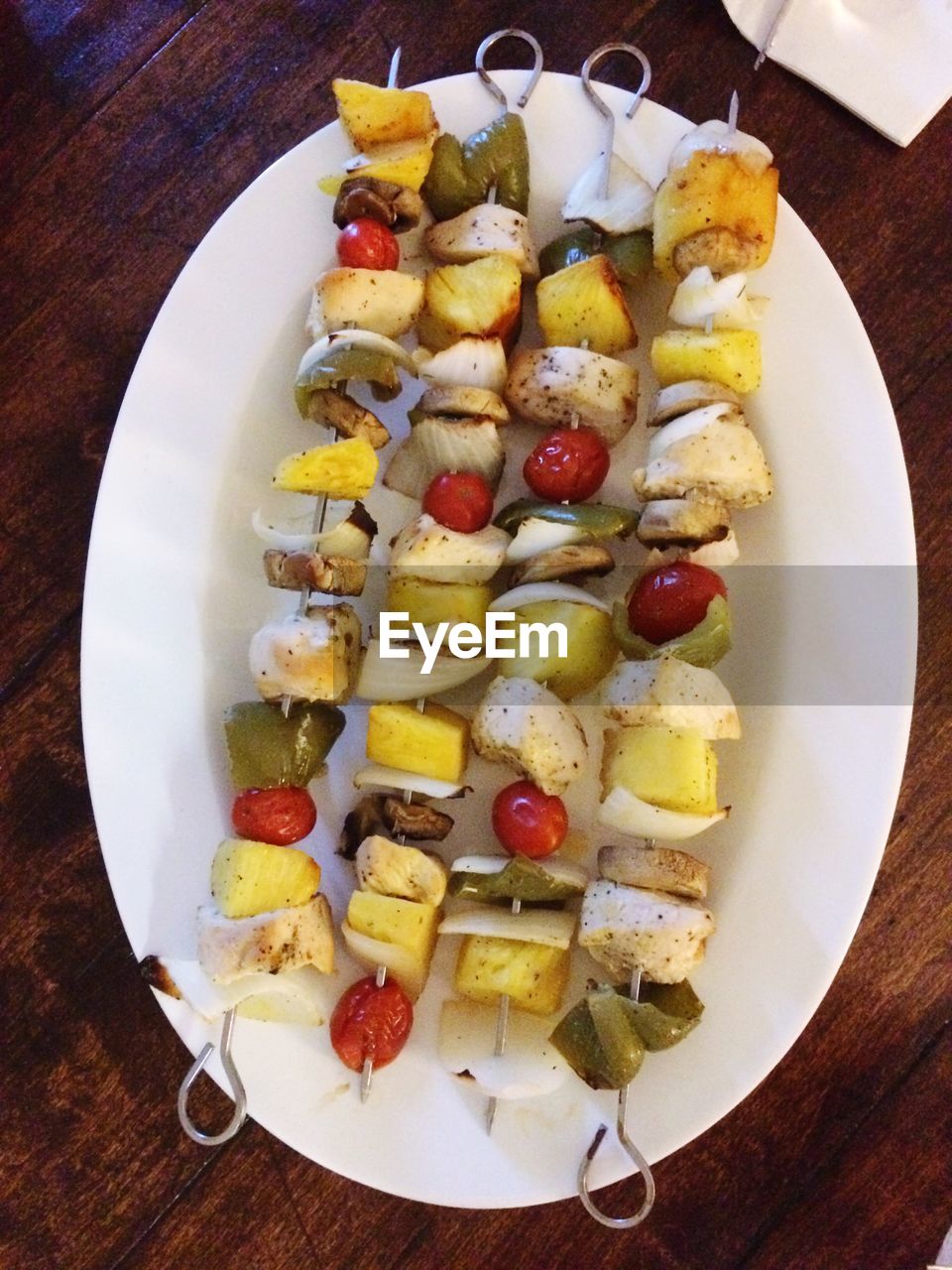 Directly above shot of skewers in tray on table