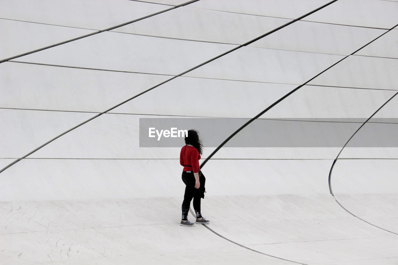 High angle view of woman standing on floor