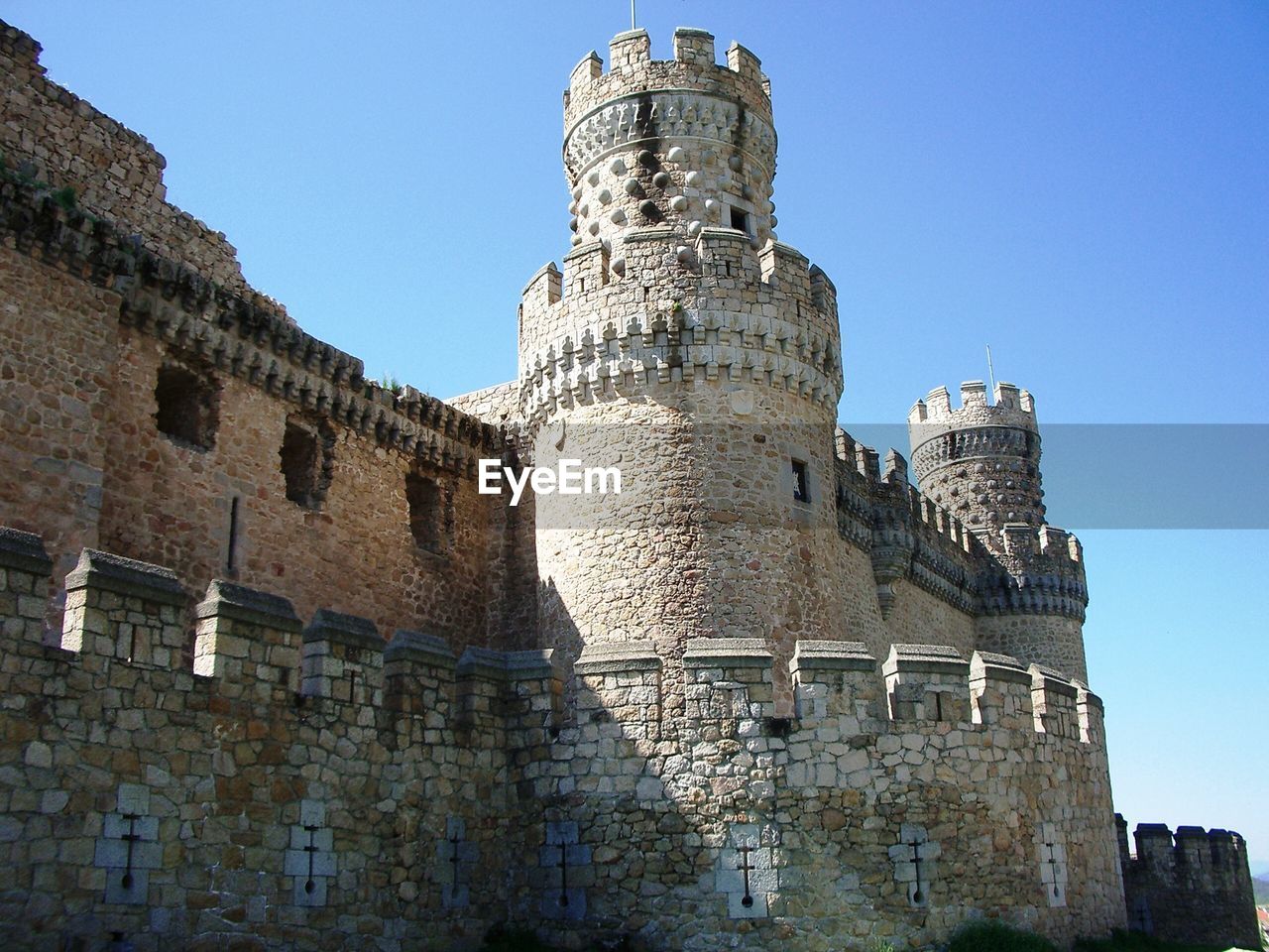 Medieval castle tower and wall stone madrid spain