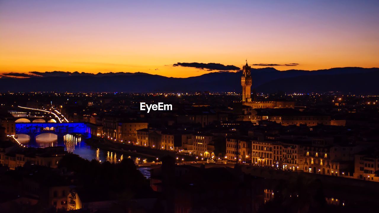 Illuminated cityscape at night