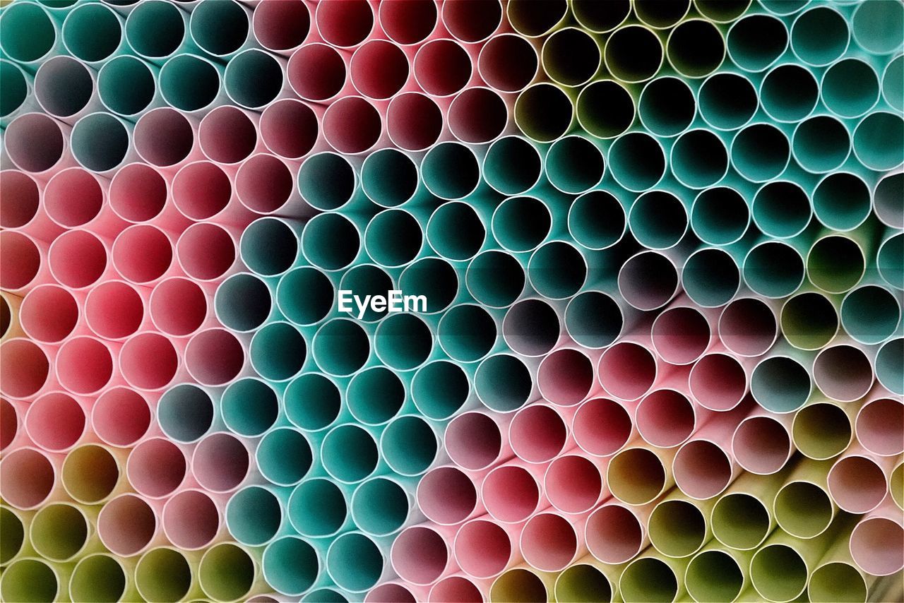 Full frame shot of colorful drinking straws arranged