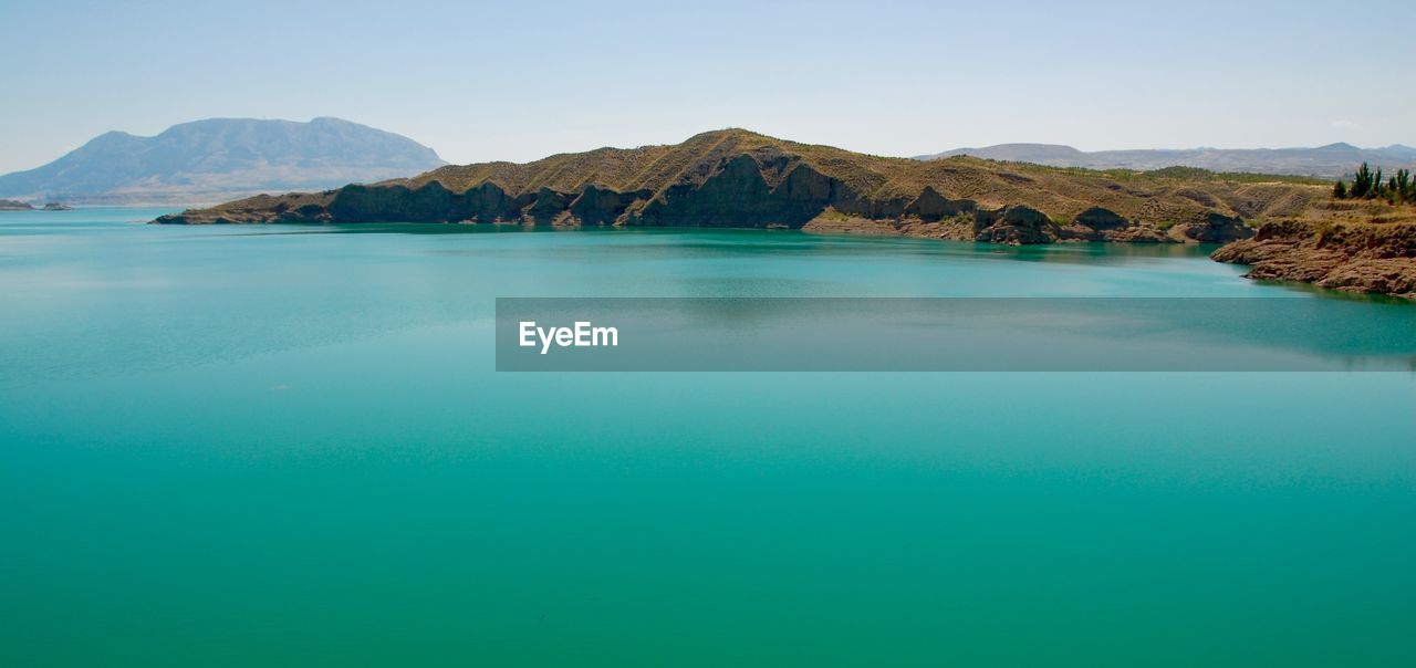 View of calm blue sea against the sky