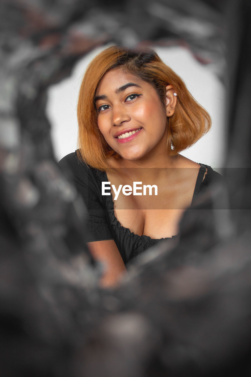 Portrait of a smiling young woman