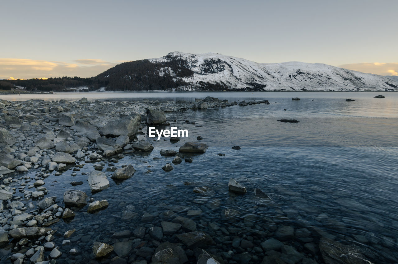 Scenic view of mountains against sky during sunset