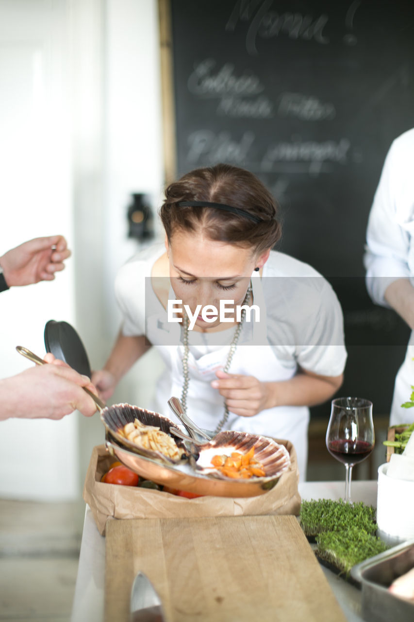 Young woman at cooking classes