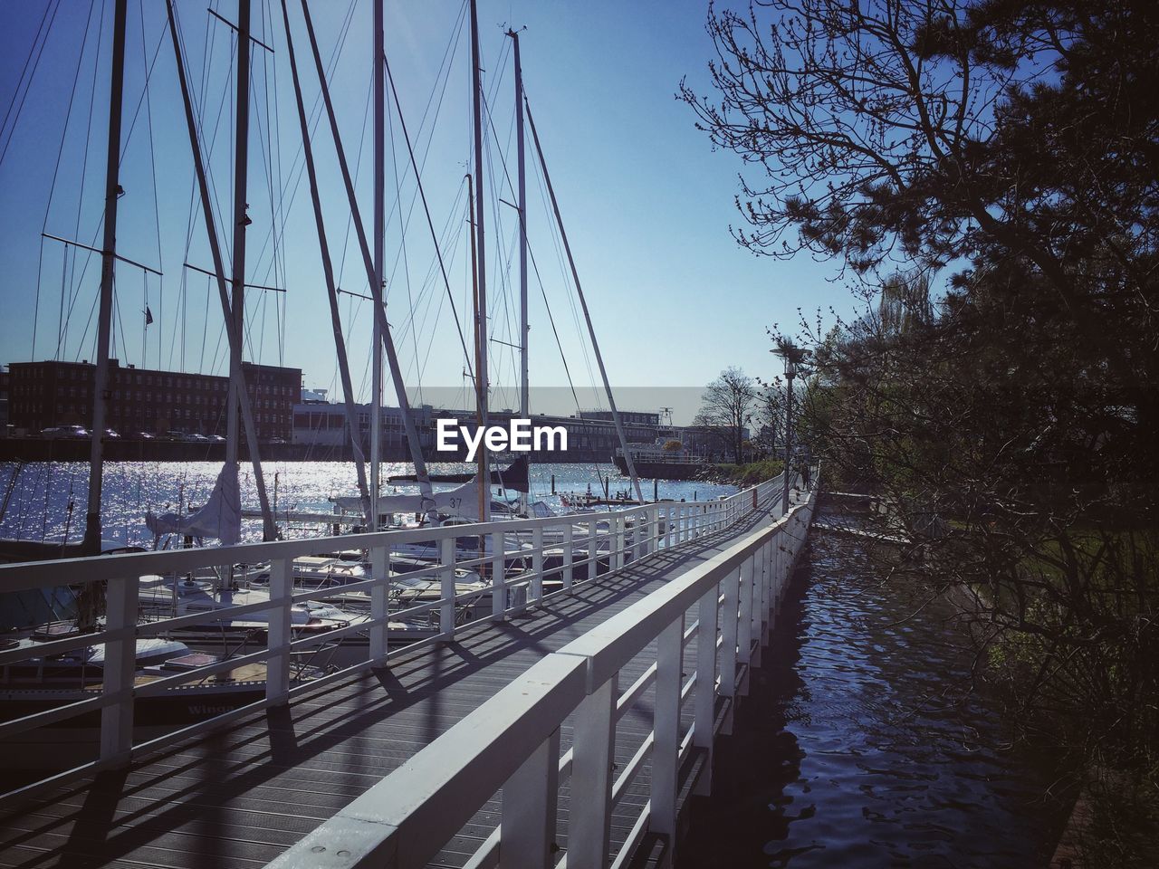 BRIDGE OVER CANAL AGAINST SKY