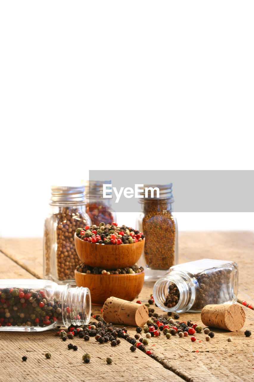 food and drink, food, container, healthy eating, wellbeing, jar, fruit, no people, freshness, spice, wood, studio shot, variation, still life, ingredient, plant, nature, organic, indoors, copy space, berry, table, bottle, basket, seed, dried food, nut, nut - food, produce