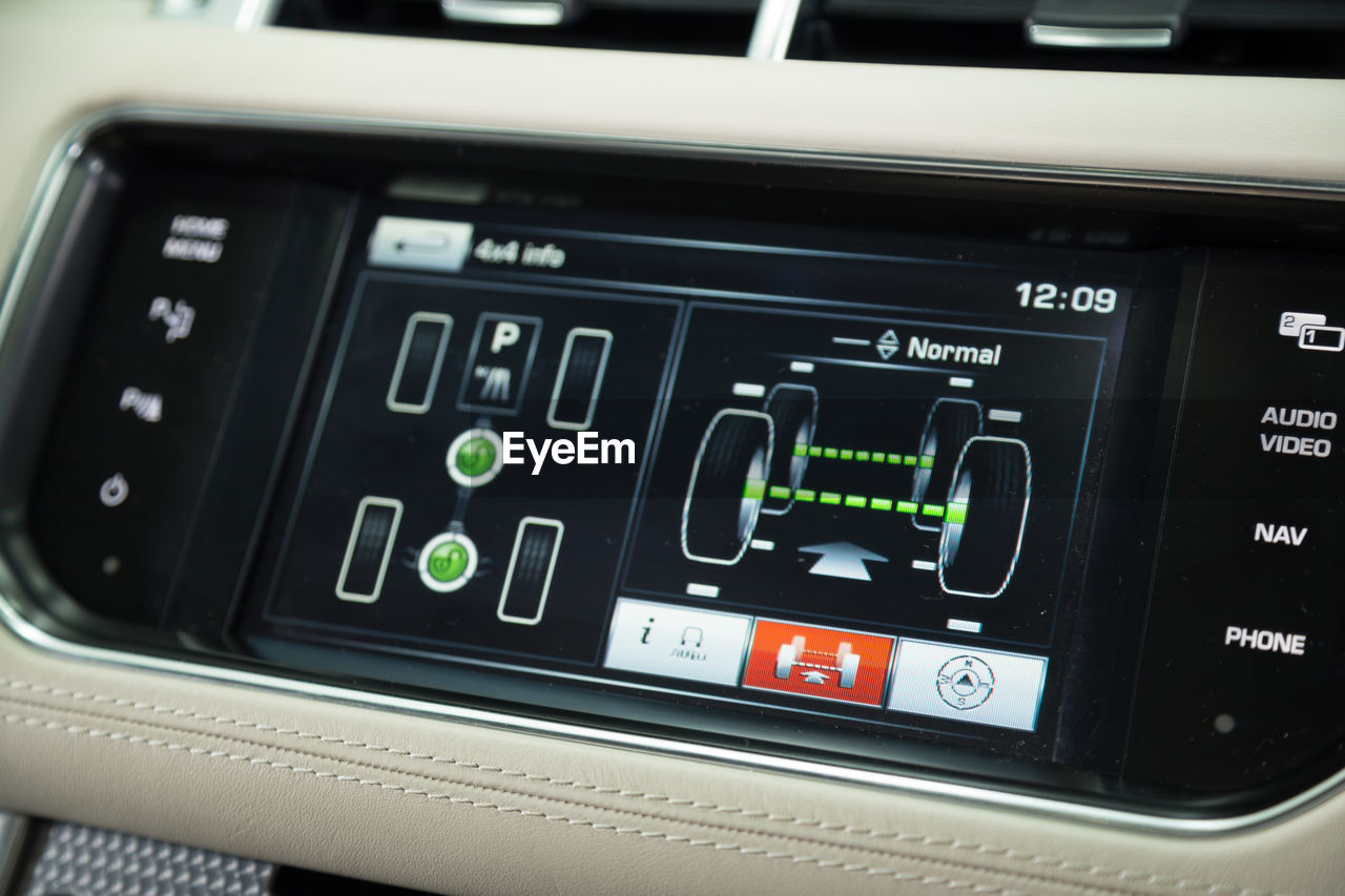 CLOSE-UP OF COMPUTER KEYBOARD IN CAR