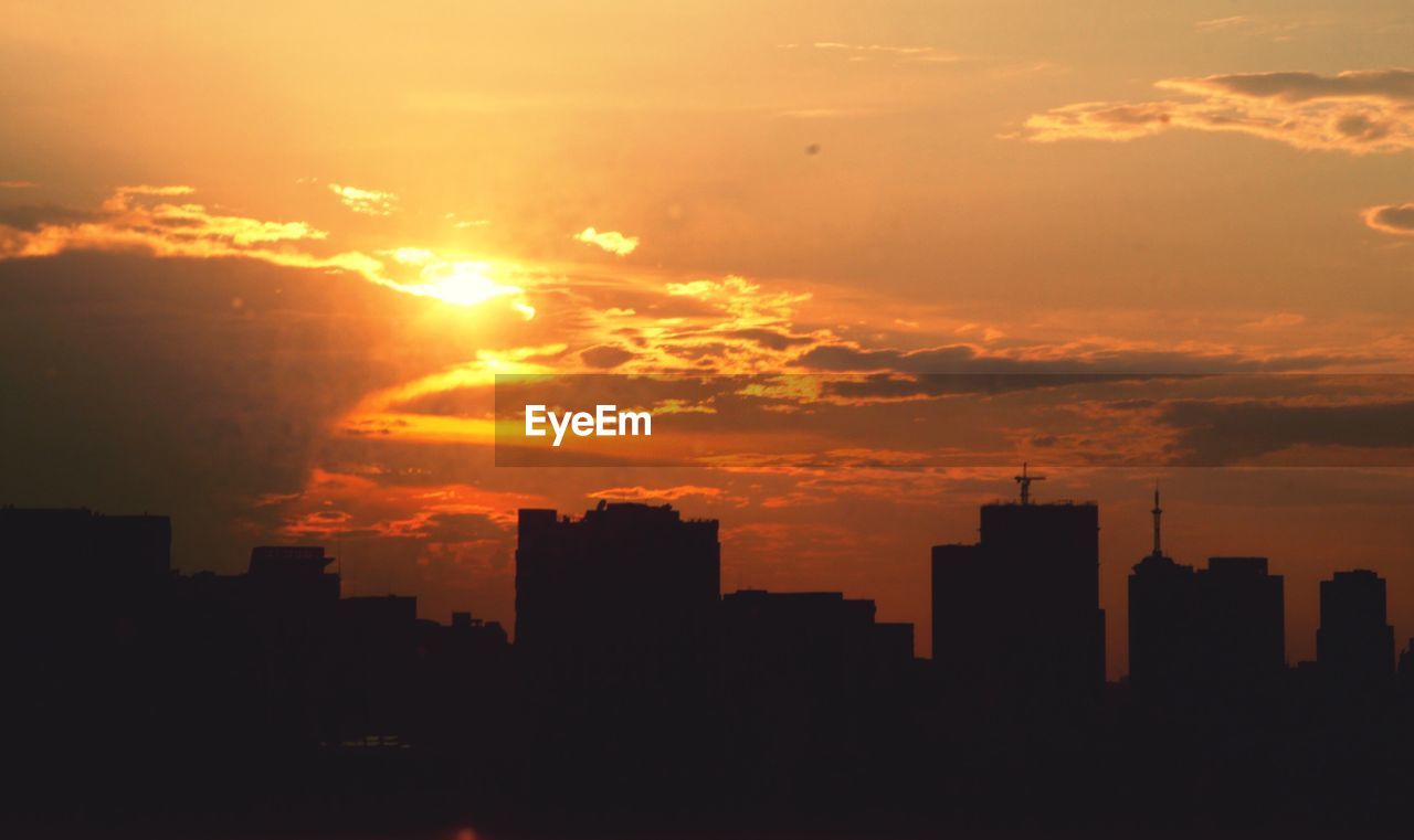 SILHOUETTE OF CITY DURING SUNSET