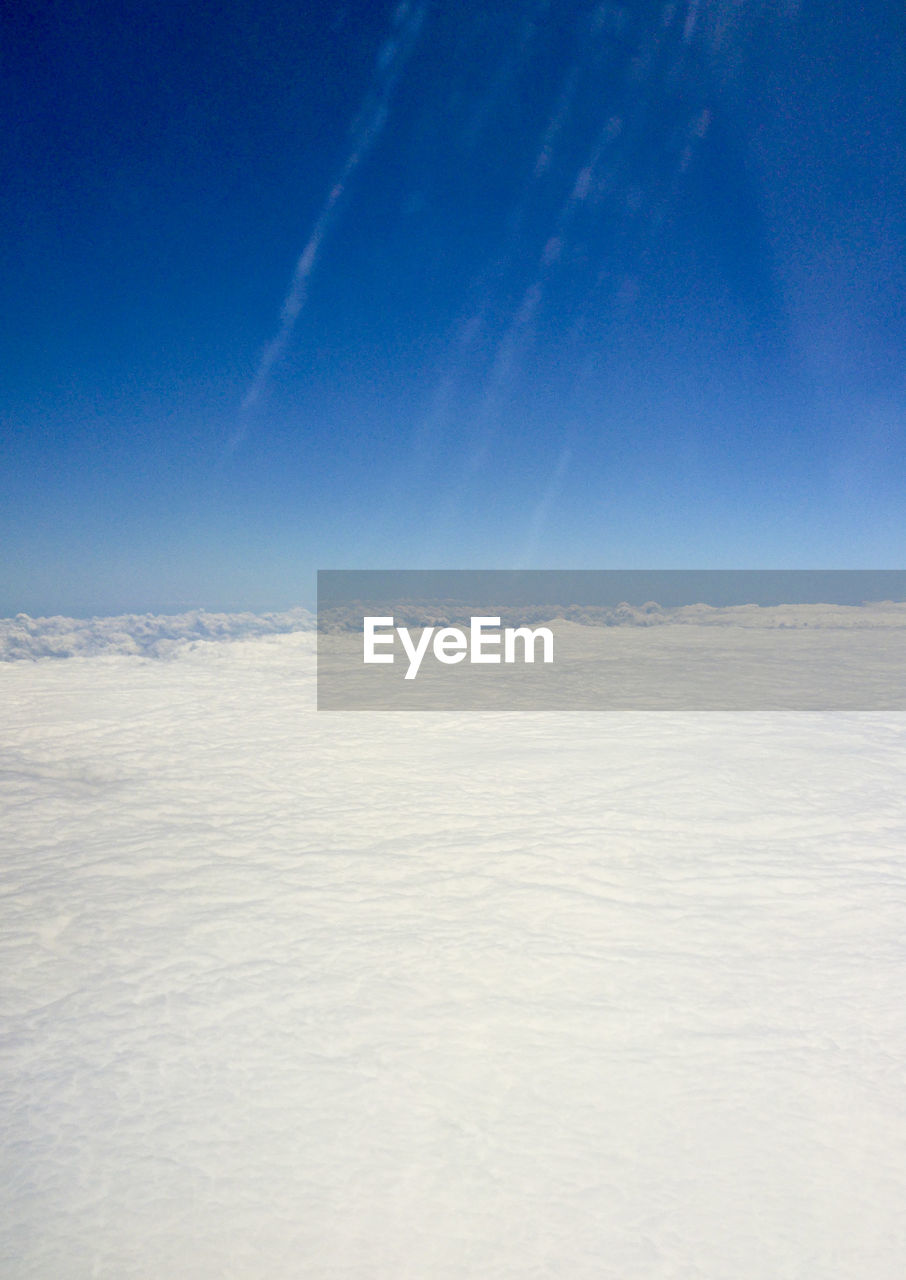 SCENIC VIEW OF BLUE SKY OVER LANDSCAPE