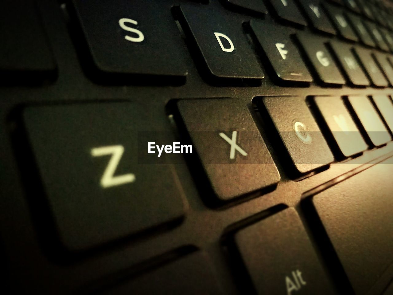 CLOSE-UP OF KEYBOARD