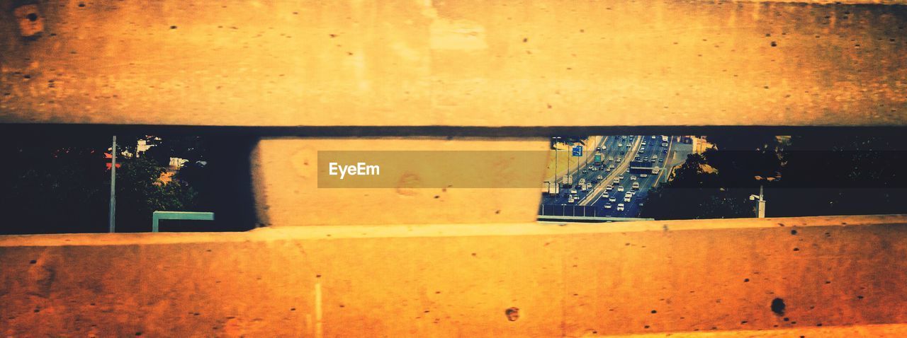 Street seen through railing