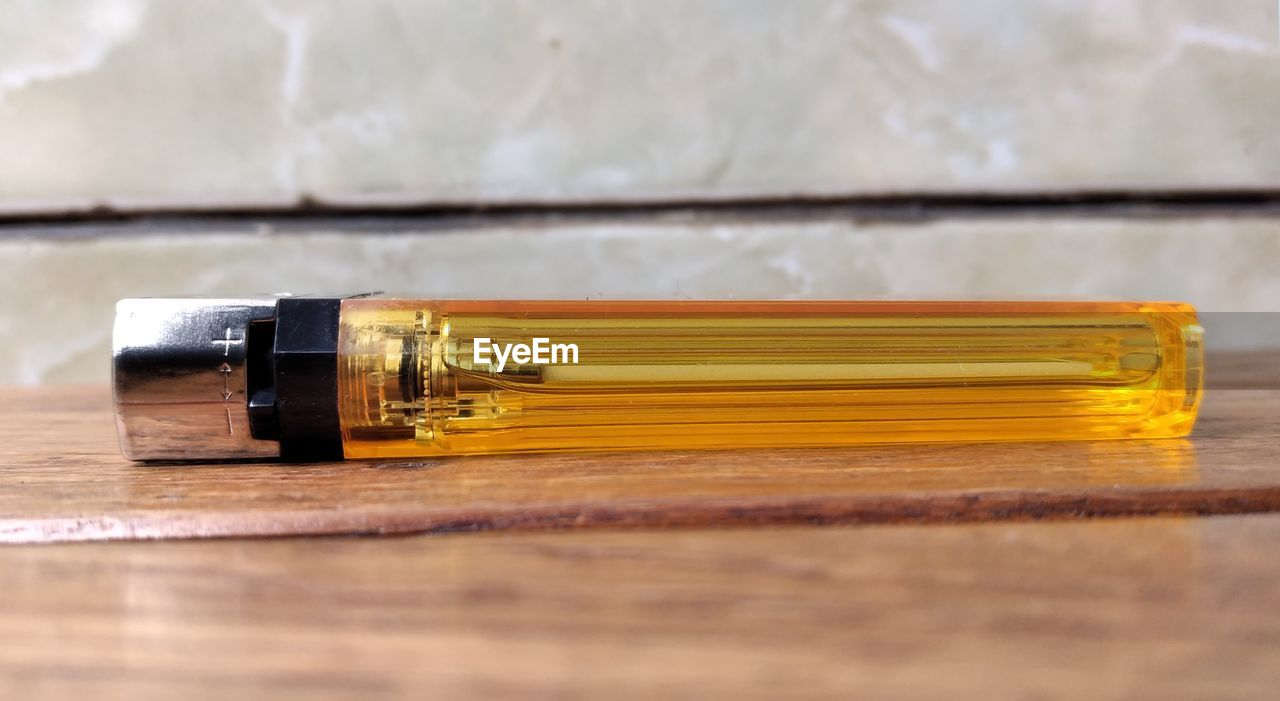 wood, table, indoors, close-up, no people, single object, yellow, still life