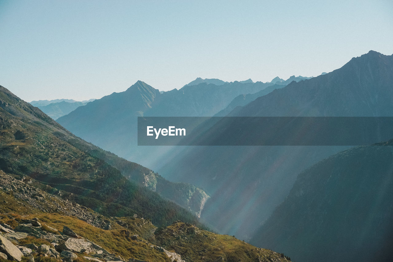 Scenic view of mountains against clear sky