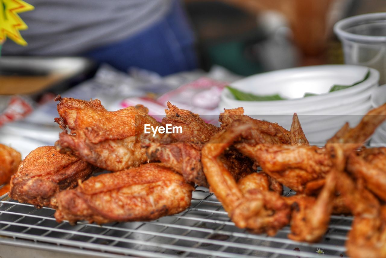 close-up of meat on barbecue grill