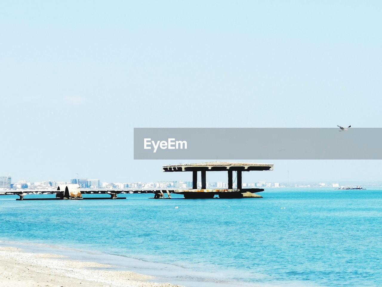 Scenic view of sea against clear sky