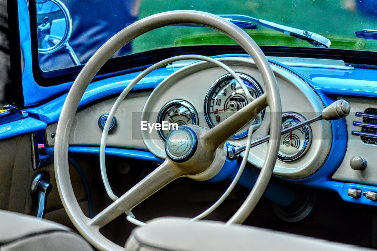 Close-up of steering wheel in vintage car