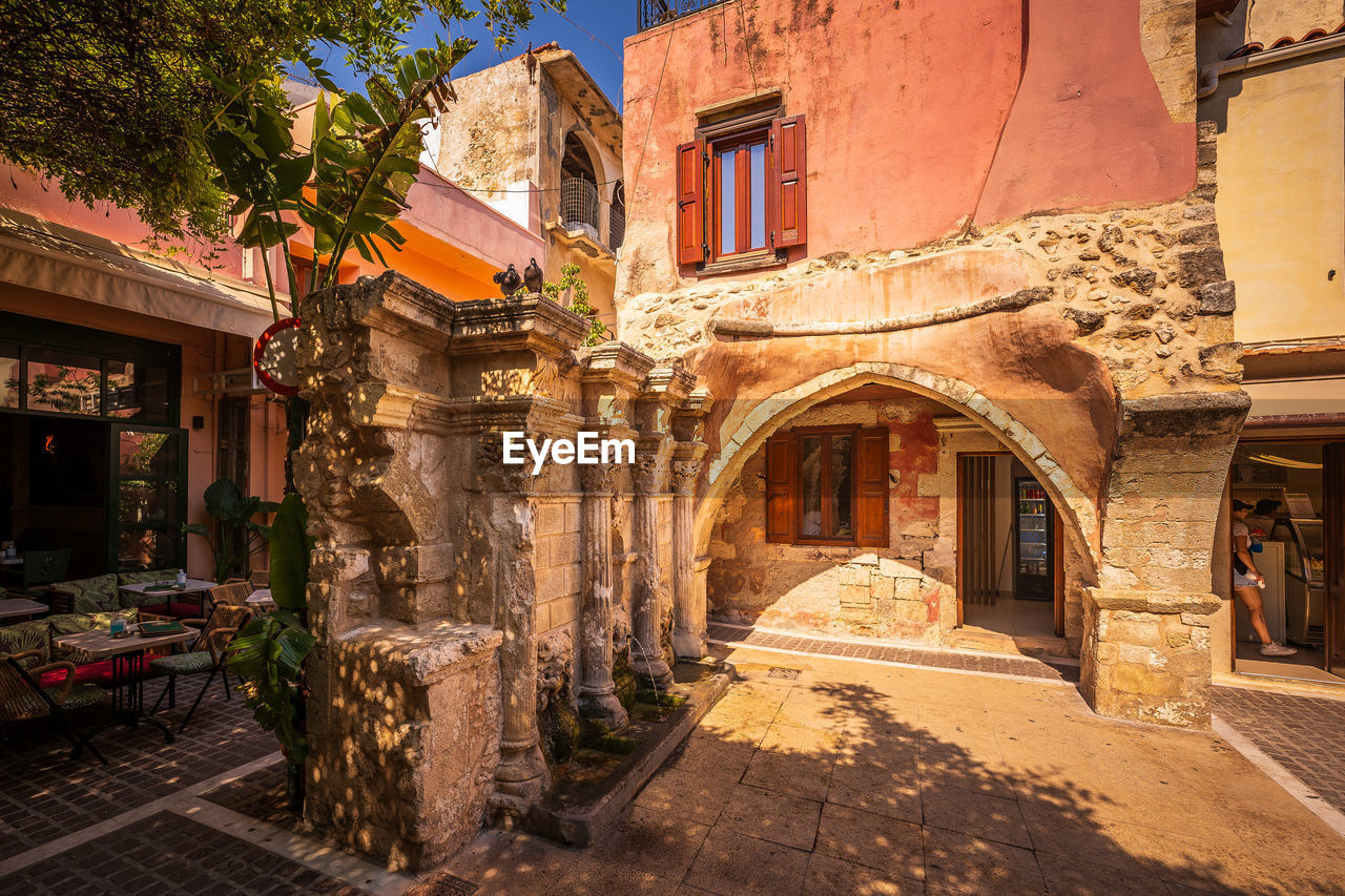 Ruins and buildings in city