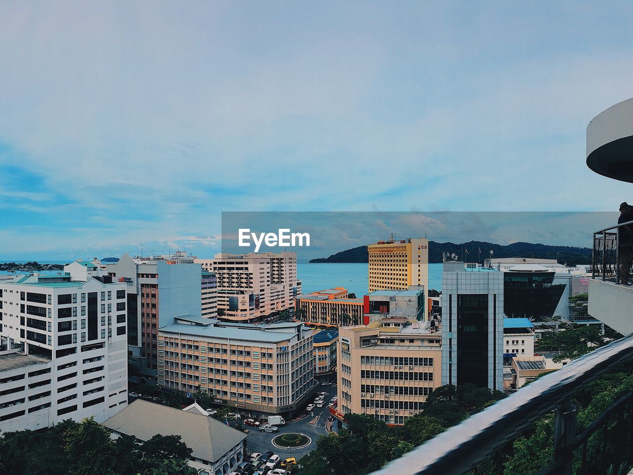 HIGH ANGLE VIEW OF RESIDENTIAL BUILDINGS AGAINST SKY