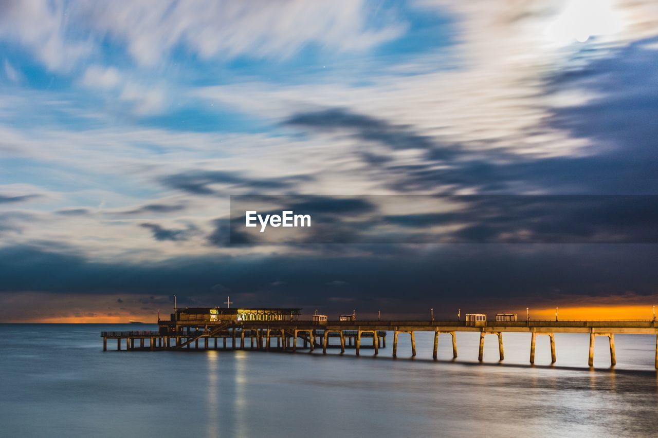 Scenic view of sea against sky at sunset