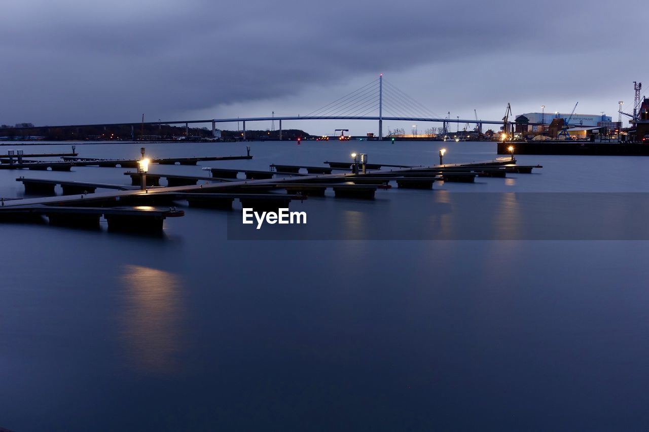 Bridge over sea against sky