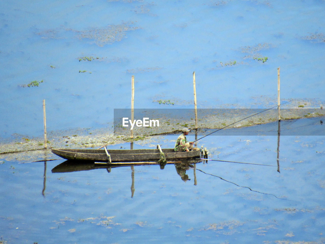 High angle view of sailboat in lake