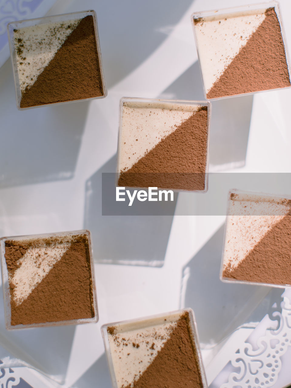 HIGH ANGLE VIEW OF CAKE IN PLATE ON TABLE
